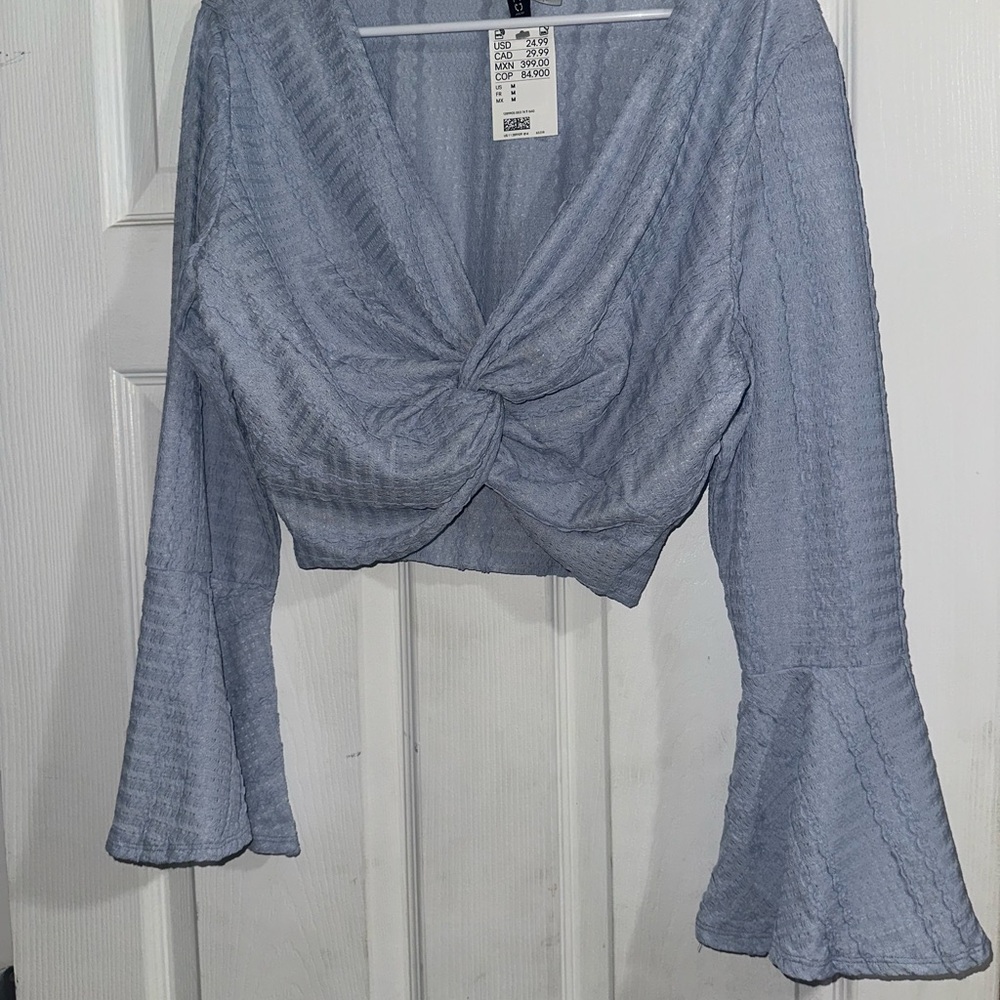 Divided Light Blue Twist Front Blouse